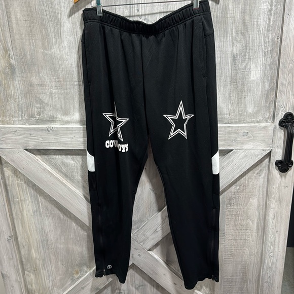 Hollaway track suit with cowboys logo. G1
